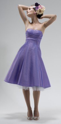 A classic empire-line tea length dress. Evening Dress